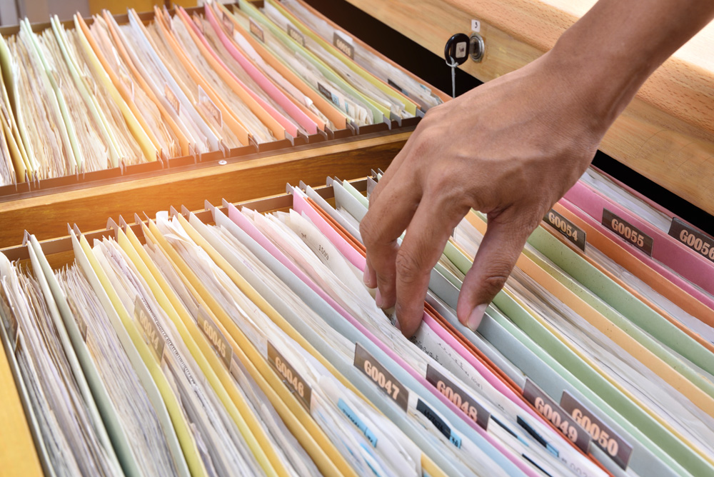 Financial documents stored in filing cabinets.